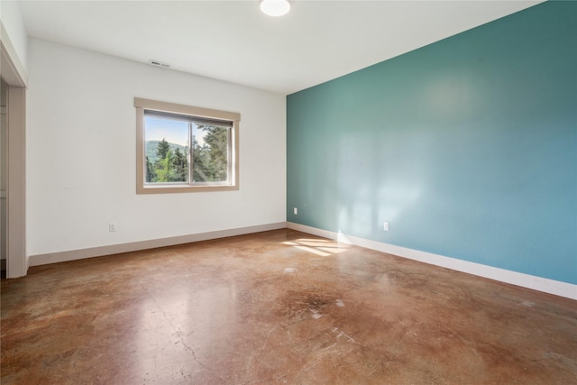 200 Lakeview Ter, Marion, MT 59925 - unfurnished bedroom featuring finished concrete flooring and baseboards