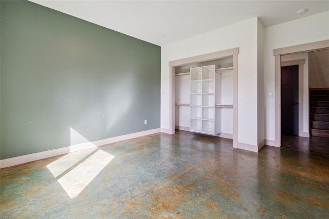200 Lakeview Ter, Marion, MT 59925 - unfurnished bedroom with concrete flooring, baseboards, and a closet