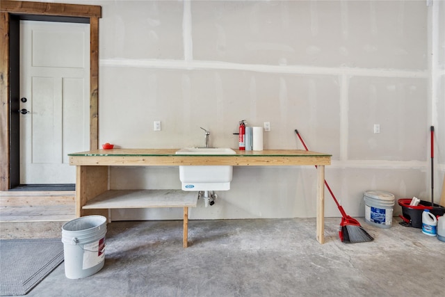 200 Lakeview Ter, Marion, MT 59925 - misc room featuring unfinished concrete flooring and a sink