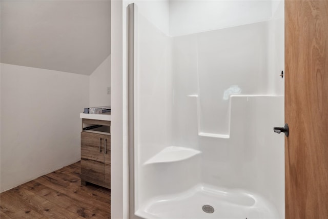 200 Lakeview Ter, Marion, MT 59925 - full bathroom featuring wood finished floors, a shower, and vaulted ceiling