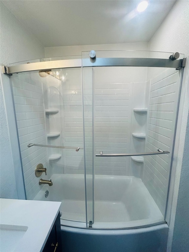 4 Weber Ave, Polson, MT 59860 - bathroom with vanity, shower / bath combination with glass door, and a textured wall
