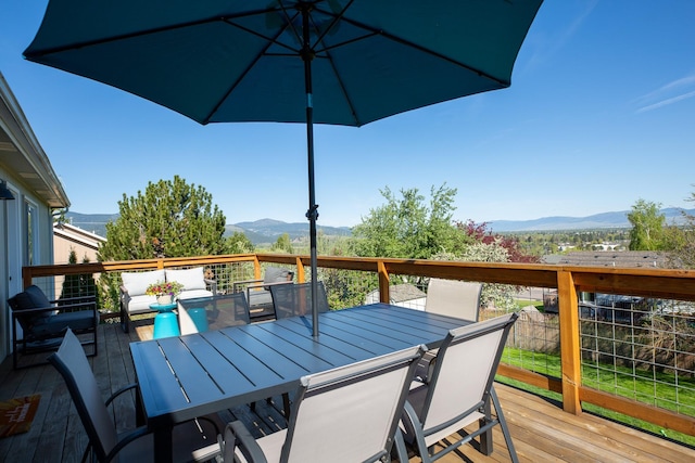 2504 Blackthorn Dr, Missoula, MT 59803 - deck featuring a mountain view, outdoor lounge area, and outdoor dining area