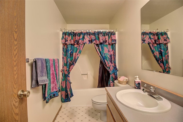 full bathroom featuring toilet, vanity, tile patterned floors, and shower / bath combo