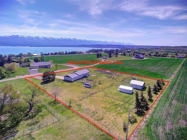 view of rural area featuring property boundaries highlighted and a water and mountain view