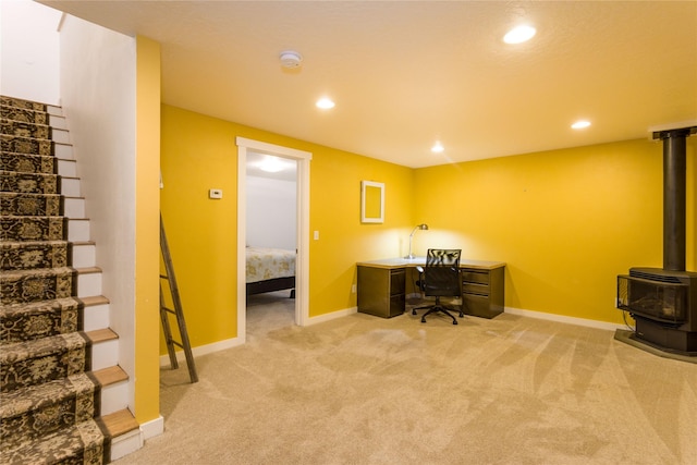 2406 Raymond Ave, Missoula, MT 59802 - office space featuring light carpet, a wood stove, recessed lighting, and baseboards