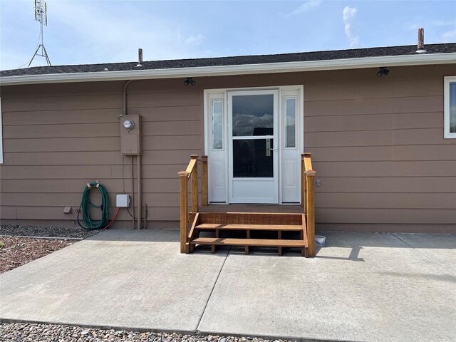 403 S Cherry St, Townsend, MT 59644 - view of exterior entry with a patio