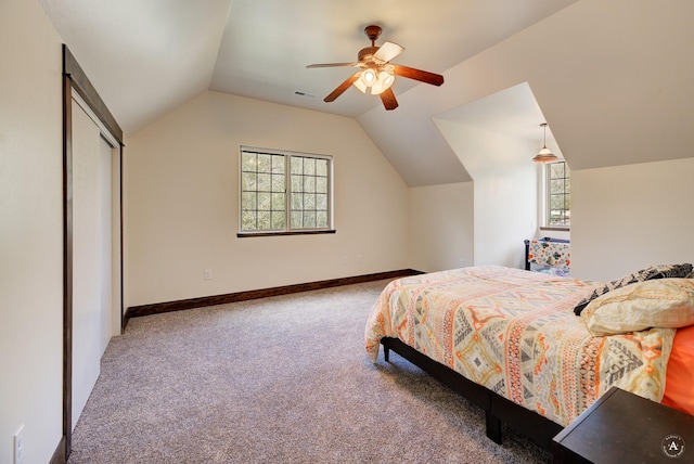 5235 Creekside Ln, Helena, MT 59601 - carpeted bedroom with lofted ceiling, multiple windows, baseboards, and ceiling fan