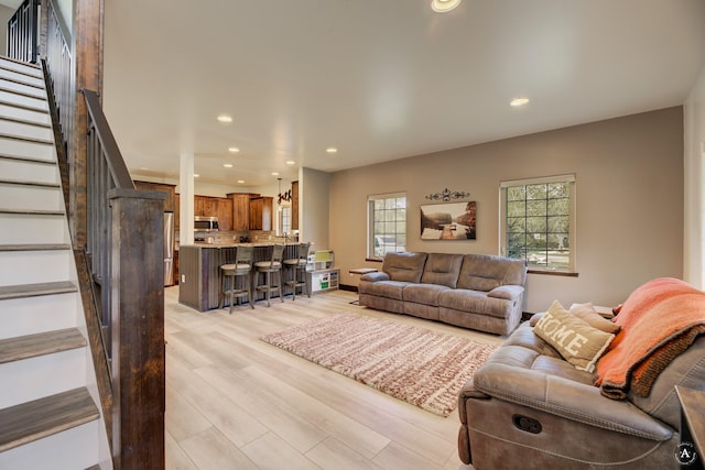 5235 Creekside Ln, Helena, MT 59601 - living area featuring stairway, light wood-style flooring, and recessed lighting