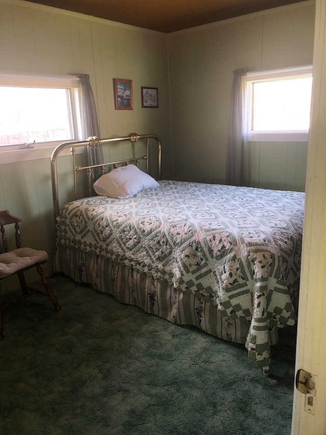 470 Duck Lake Rd, Browning, MT 59417 - carpeted bedroom featuring multiple windows