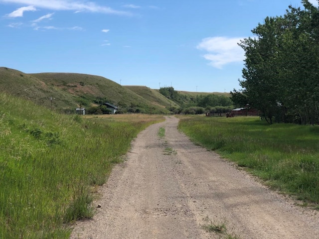 470 Duck Lake Rd, Browning, MT 59417 - view of dirt / gravel road with a view of rural / pastoral area and a mountain view