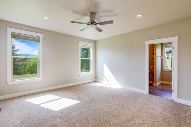 unfurnished room featuring carpet floors, baseboards, a ceiling fan, and recessed lighting