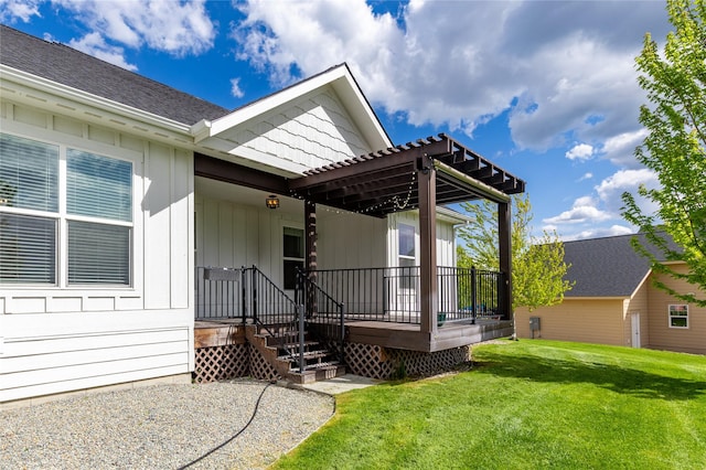 entrance to property featuring a lawn and a pergola