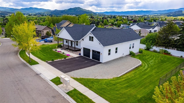 aerial perspective of suburban area featuring a mountain backdrop