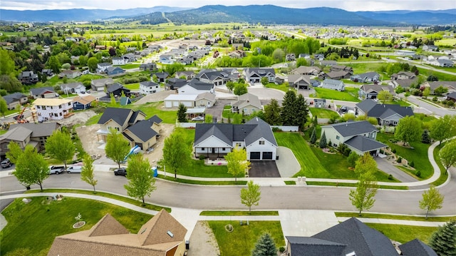 aerial view of residential area with a mountain backdrop