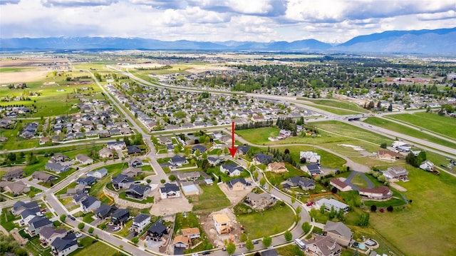aerial overview of property's location with a mountain backdrop
