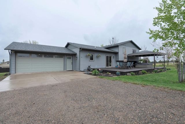 15 Lone Mountain Rd, Clancy, MT 59634 - view of front of home featuring a gazebo, an attached garage, asphalt driveway, a front yard, and a shingled roof