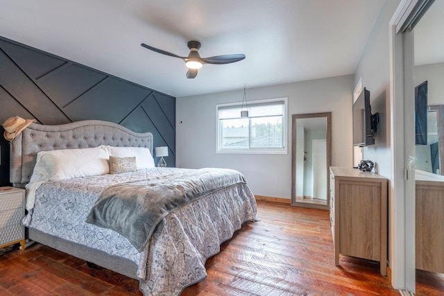 15 Lone Mountain Rd, Clancy, MT 59634 - bedroom with hardwood / wood-style floors, baseboards, and a ceiling fan