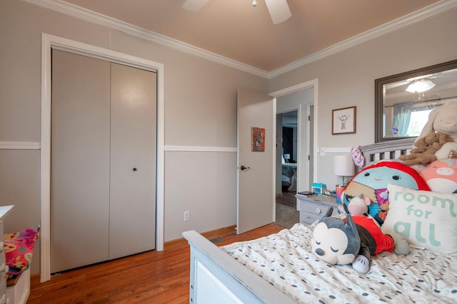15 Lone Mountain Rd, Clancy, MT 59634 - bedroom with wood finished floors, ornamental molding, a closet, and ceiling fan
