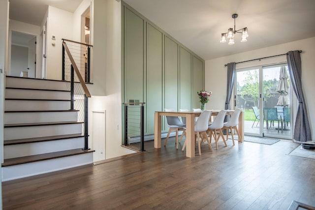 15 Lone Mountain Rd, Clancy, MT 59634 - dining room with baseboard heating, a chandelier, wood finished floors, and stairs