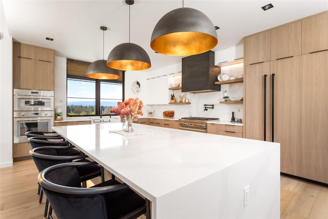 kitchen with open shelves, modern cabinets, light wood-style floors, and light countertops