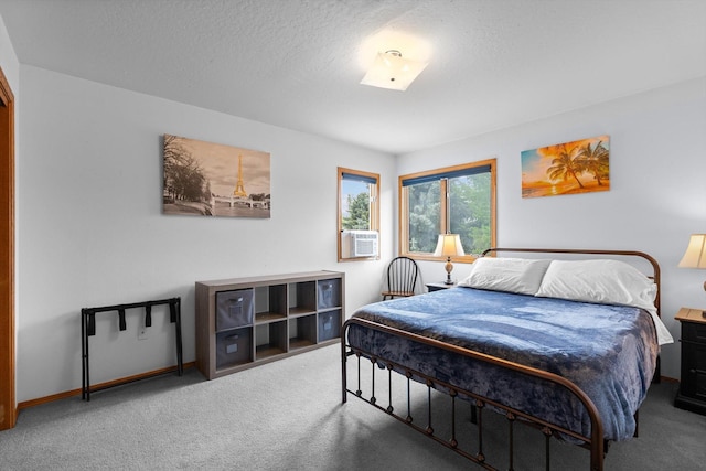 525 Tower St, Missoula, MT 59804 - carpeted bedroom featuring baseboards, a textured ceiling, and cooling unit