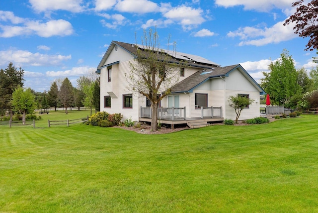 525 Tower St, Missoula, MT 59804 - rear view of property with solar panels and a deck