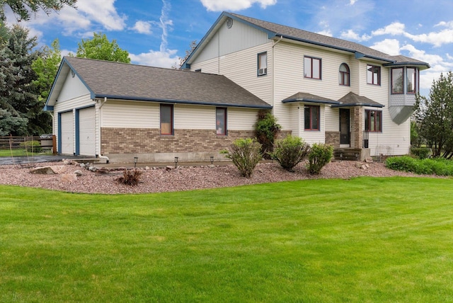 525 Tower St, Missoula, MT 59804 - view of front facade featuring brick siding, asphalt driveway, a garage, and a shingled roof