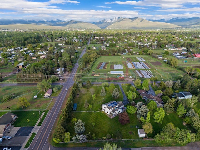 525 Tower St, Missoula, MT 59804 - aerial overview of property's location featuring a mountain backdrop and nearby suburban area
