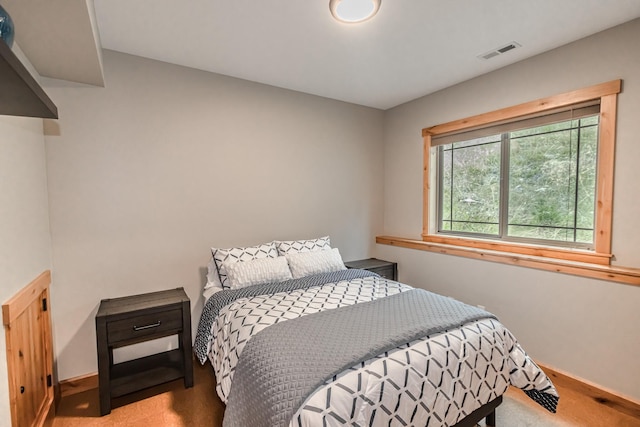 21208 Osprey Loop, Rollins, MT 59931 - bedroom featuring carpet flooring and baseboards