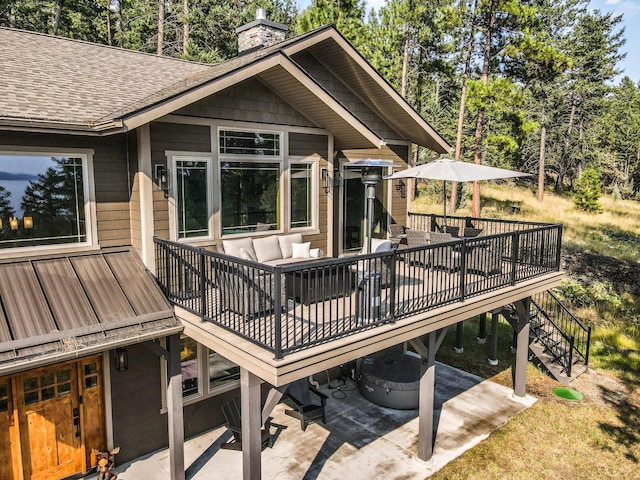 21208 Osprey Loop, Rollins, MT 59931 - wooden terrace with an outdoor hangout area, a patio area, stairway, outdoor dining area, and view of scattered trees