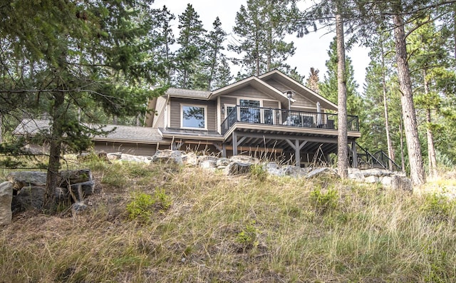 21208 Osprey Loop, Rollins, MT 59931 - view of front of home featuring a wooden deck