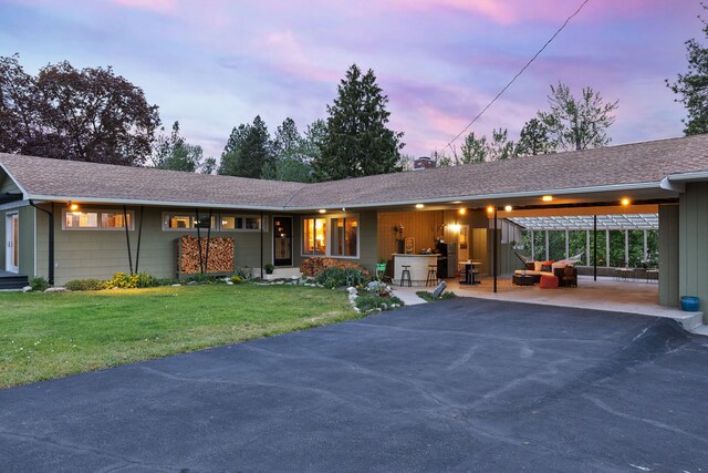 920 Adirondac Ave, Hamilton, MT 59840 - ranch-style house with asphalt driveway, a shingled roof, and a yard