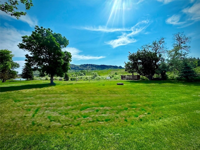 71 Seibold Ln, Cascade, MT 59421 - view of home's community with a lawn and a mountain view