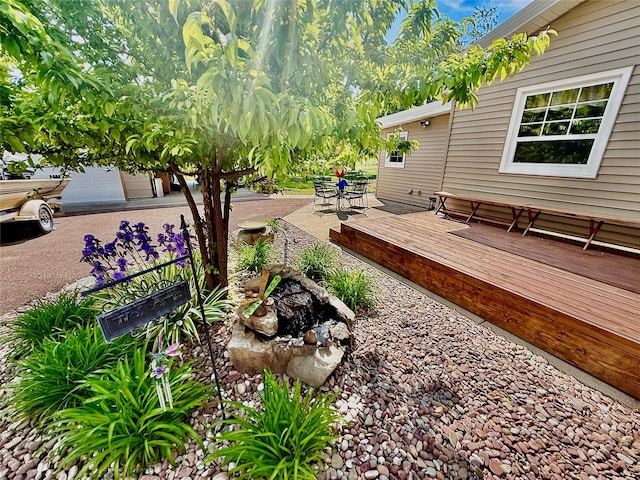 71 Seibold Ln, Cascade, MT 59421 - view of yard featuring a deck and outdoor dining area