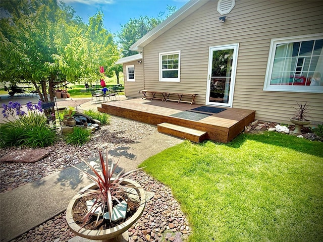 71 Seibold Ln, Cascade, MT 59421 - view of green lawn with a wooden deck and a fire pit