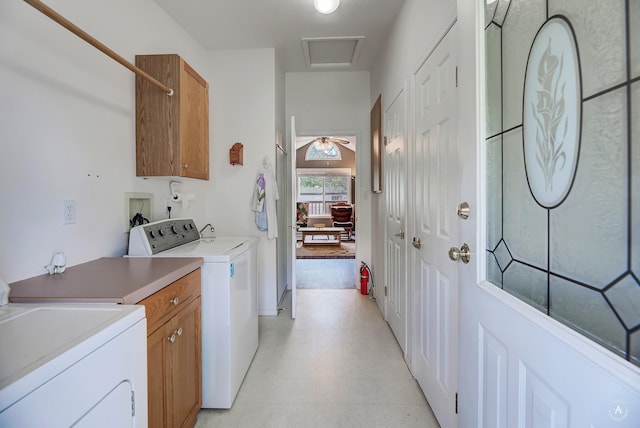 73 Seibold Ln, Cascade, MT 59421 - laundry area with cabinet space, light floors, washer and dryer, and attic access
