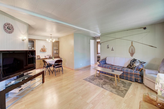 73 Seibold Ln, Cascade, MT 59421 - living room featuring a chandelier and wood finished floors