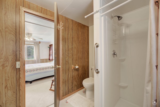 73 Seibold Ln, Cascade, MT 59421 - ensuite bathroom featuring a shower with shower curtain, toilet, and ceiling fan