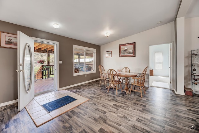 73 Seibold Ln, Cascade, MT 59421 - dining room featuring wood finished floors, baseboards, and vaulted ceiling