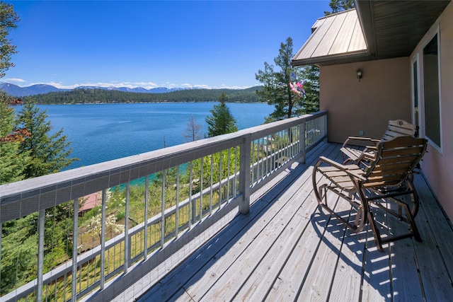 28152 White Swan Ln, Polson, MT 59860 - deck featuring a water and mountain view
