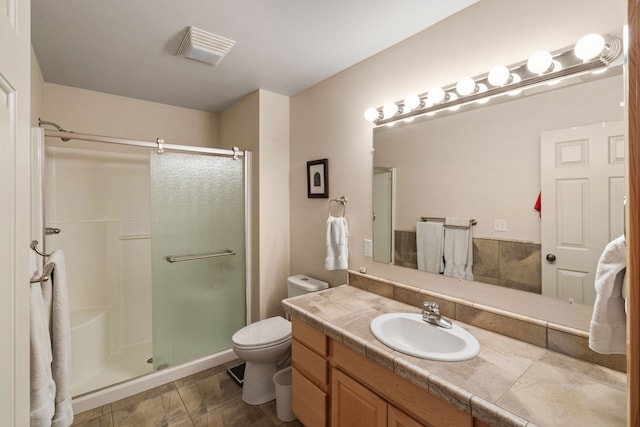 28152 White Swan Ln, Polson, MT 59860 - full bath with a shower stall, toilet, and vanity