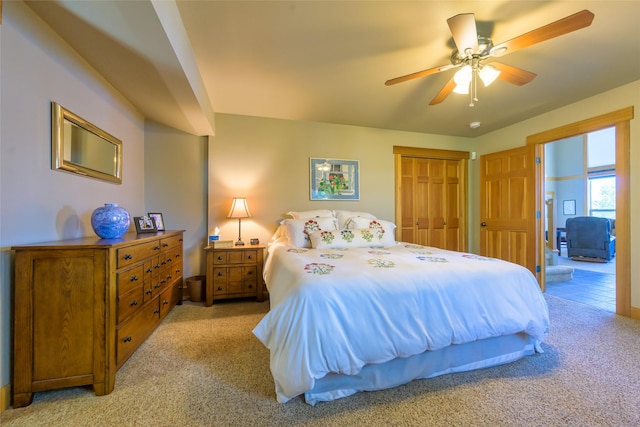28152 White Swan Ln, Polson, MT 59860 - bedroom featuring light carpet, a closet, and ceiling fan