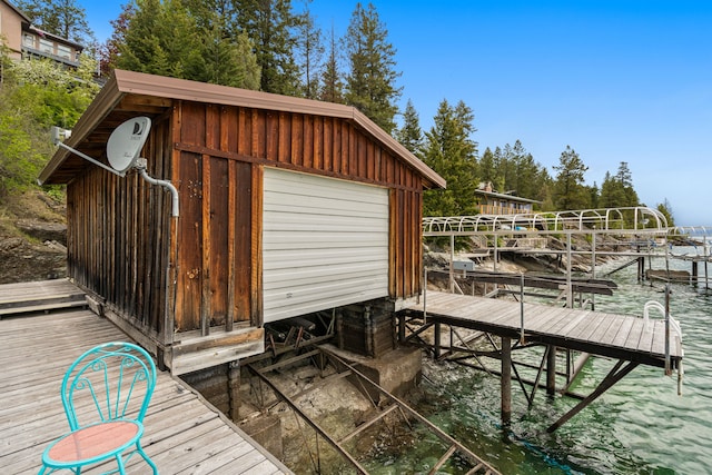 28152 White Swan Ln, Polson, MT 59860 - dock area featuring a water view and boat lift