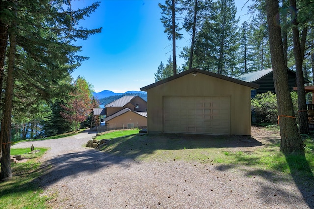 28152 White Swan Ln, Polson, MT 59860 - detached garage featuring a mountain view