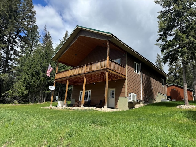 26 Castele Ln, Trout Creek, MT 59874 - back of house featuring a lawn, a deck, and a cooling unit