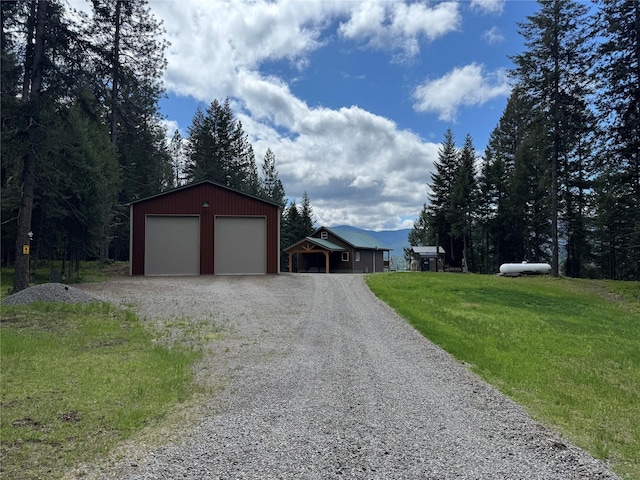 26 Castele Ln, Trout Creek, MT 59874 - garage with gravel driveway