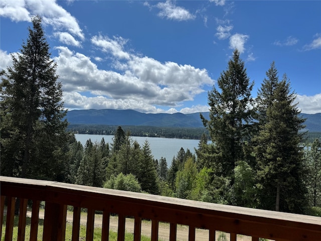 26 Castele Ln, Trout Creek, MT 59874 - water view with a mountainous background and a heavily wooded area