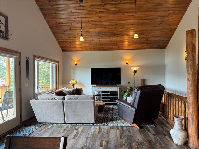 26 Castele Ln, Trout Creek, MT 59874 - living area featuring lofted ceiling, wood finished floors, wooden ceiling, and baseboards