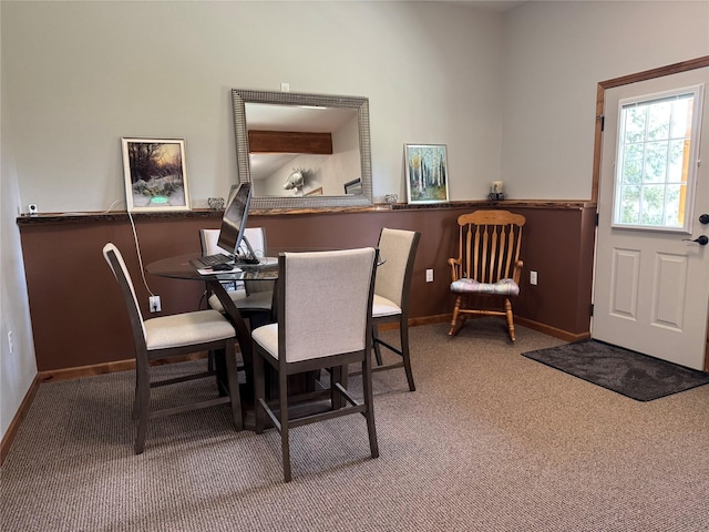26 Castele Ln, Trout Creek, MT 59874 - carpeted dining area with baseboards