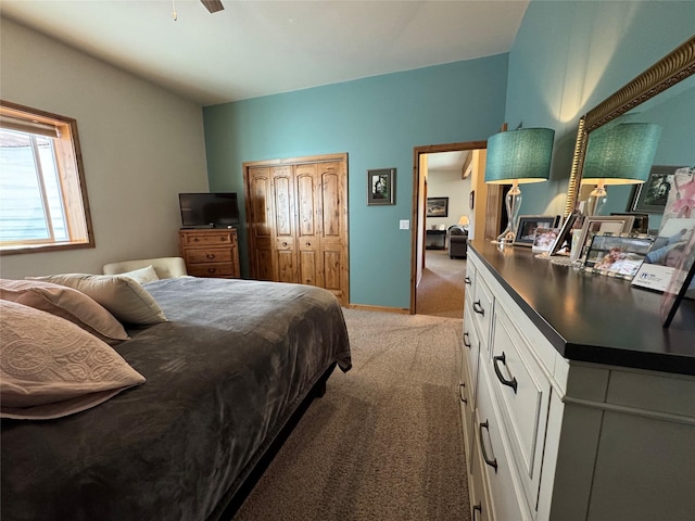 26 Castele Ln, Trout Creek, MT 59874 - bedroom with light colored carpet, a closet, and a ceiling fan